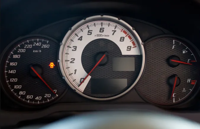 Car instrument cluster with speedometer, rev counter and fuel gauge